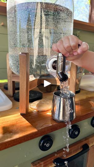 5.5K views · 3.1K reactions | Comment "Link" for💧dispenser + Mud Kitchen!   🌿Mud Kitchen @woodnpoppy  Which BTW you can TOTALLY opt for having 1 or 2 pumps !   *Since we live in a cooler climate and only experience a few short weeks of warm weather, we did not get the pumps. If you live in a hot climate, TOTALLY get the PUMPS!   💧Water Dispenser is a TARGET FIND! 🎯 The tank is plastic too! Not glass! 🤩  #outdoorplay #mudkitchen #mudkitchenideas #targetfind #mudkitchenplay #toddleractivities  #outdoorsensoryplay #sensoryplayideas  #kidssensoryplayideas #waterplay | Teachingbythemountains | pitufollow · No, no, no. Listen! Mud Kitchen Water Dispenser, Mud Kitchen For Kids, Mud Kitchen, Target Finds, Water Play, Water Dispenser, Sensory Play, 1 Or 2, Outdoor Play