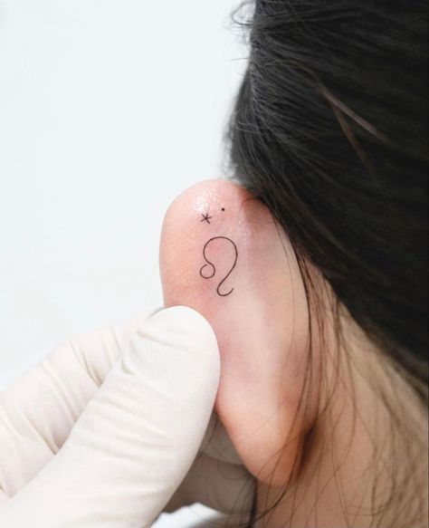 Leo Tattoo Behind The Ear, Leo Ear Tattoo, Behind Ear Leo Tattoo, Leo Zodiac Tattoos Behind Ear, Small Tattoo Leo Zodiac, Small Leo Zodiac Tattoos For Women, Ear Outline Tattoo, Zodiac Signs Leo Tattoo, Leo Sign Tattoo