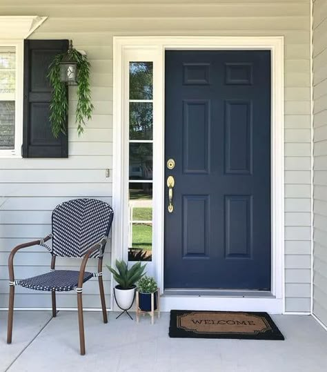 20 Brilliant Blue Front Door Ideas » Lady Decluttered Navy Blue Front Door And Shutters Exterior Paint Colors, Navy Blue Door And Shutters, Navy Blue Front Door Gray House, Grey House Navy Door, Best Blue Paint For Front Door, Midnight Blue Front Door, Blue Front Door Ideas, Front Door Colors For Dark Blue House, Dark Blue Doors Interior