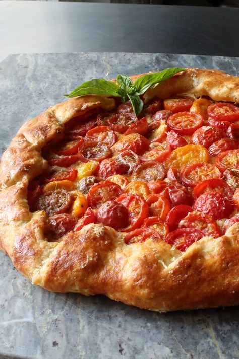 Cherry Tomato and Cheese Galette | "It's not too complicated and Chef John's video was very helpful in making the crust. Thanks!!" #dinnerideas #dinnerrecipes #familydinnerideas #supper #supperideas Cherry Tomato Galette, Cherry Tomato Quiche, Tomato Cheese Tart, Cherry Tomato Pizza Recipes, Cherry Tomato Tart Recipes, Tomato Goat Cheese Galette, Tomato Galette Recipe, Tomato Gallette Recipe, Galette Tomato