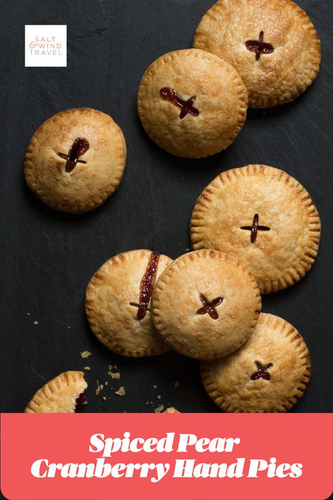 🍐 Add a cozy touch to your Thanksgiving with these Easy Spiced Pear Cranberry Hand Pies! 🍂 Filled with juicy pears, tart cranberries, and warm spices, these hand pies are a delightful blend of sweet and tangy. Perfect for a festive, portable dessert that everyone will love! 🥧 #ThanksgivingDesserts #HandPies #FallFlavors #HolidayBaking Cranberry Hand Pies, Holiday Hand Pies, Christmas Hand Pies, Cranberry Pear Pie, Pear Hand Pies, Mini Hand Pies, Individual Treats, Petite Desserts, Desserts From Around The World