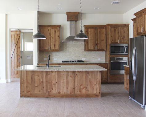 Rustic kitchen with Knotty Alder cabinetry - Spring Branch, Texas Rustic Kitchen Wood Cabinets, Knotty Alder Kitchen Cabinets Farmhouse, Knotty Pine Cabinets Kitchen, Alder Cabinets Kitchen, Knotty Alder Island, Rustic Alder Kitchen, Pine Wood Kitchen, Knotty Alder Kitchen Cabinets, Knotty Alder Kitchen