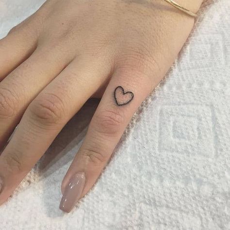 1. Tiny Heart Tattoos On Small Finger White Heart Tattoos, Small Heart Tattoo, Heart Tattoo On Finger, Tiny Finger Tattoos, Heart Tattoo Wrist, Red Heart Tattoos, Tiny Heart Tattoos, Small Heart Tattoos, Finger Tattoo For Women