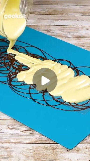 Cookist Wow on Instagram: "Kick up your #desserts with these gorgeous #decorations 😍 You’ll astonish everybody 😎 Here are some ideas to try:  1️⃣ 👉INGREDIENTS Acetate Melted dark chocolate Melted white chocolate  👉METHOD 1. Pour melted dark chocolate into a piping bag. 2. Draw various circles and spirals on an acetate. 3. Let dry. 4. Pour white chocolate on top covering the acetate. Let dry. 5. Cut several triangles and use them to decorate a muffin. ——————————————————————————  2️⃣ 👉INGREDIENTS Acetate Cinnamon powder Melted white chocolate  👉METHOD 1. Sprinkle ground cinnamon onto the acetate. 2. Pour melted white chocolate into a pipping bag. 3. Make several balls in the acetate. 4. Place another acetate on top and use a glass to press each ball to flatten. 5. Let set. Serve with c Things To Do With Melted Chocolate, Chocolate Art Decoration, Melted Chocolate Decorations, White Chocolate Decorations For Cake, Melted Chocolate Cake Decorations, Chocolate Garnish Ideas, Melting Chocolate For Dipping, Melted Chocolate For Dipping, Blown Sugar