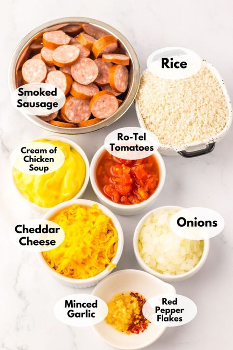 Cheesy Sausage and Rice Casserole Crockpot Meal With Kielbasa, Dinner Kielbasa Recipes, Kielbasa And Rice Casserole, Kielbasa And Rice Skillet, Recipes With Andouille Sausage Healthy, Rice Kielbasa Recipes, Smoked Kielbasa Recipes Skillet Meals, Smoked Sausage Recipes Rice, Quick Kielbasa Recipes