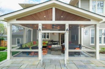 This custom Craftsman style screened room by Design Builders uses our heaters to keep the space both comfortable and beautiful; ready for entertaining year round. #patioheater #patiodecor #design Screened Porch Designs, Porch Addition, Building A Porch, Sunroom Designs, Enclosed Patio, Flagstone Patio, Screened In Patio, Backyard Porch, House With Porch