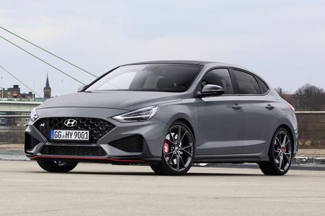 Hyundai's N brand expansion continues in the US. The Hyundai Veloster N will soon be joined by the just-revealed Kona N and, in the near future, the Elantra N. Meanwhile in the UK, the i30 N hatchback and its ridiculously cool fastback counterpart have been refreshed for the new model year and, bottom line, they're better than ever. Now, the i30 N isn't really necessary in our neck of the woods but the i30 N Fastback would be more than welcome. The closest we will get is the traditional three- Hyundai I30 N Line, I30 N Line, Track Driving, Sound System Speakers, Hyundai I30, Hyundai Veloster, Sport Seats, Still Waiting, Running Lights