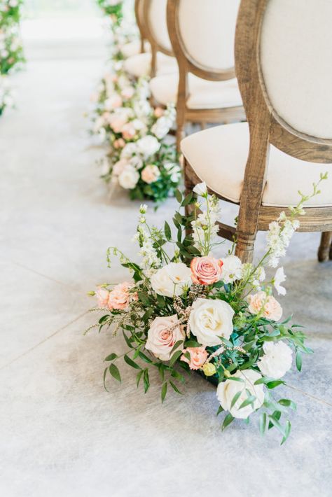 Blush florals details during ceremony Ceremony Aisle Floral Arrangements, Chair Arrangement Wedding Ceremony, Large Flower Centerpieces Wedding, Wedding Ceremony Aisle Florals, Blush Pink Wedding Ceremony, Ceremony Chair Flowers, Wedding Aisle Floral Arrangements, Aisle Arrangements Wedding Ceremony, Aisle Florals Wedding