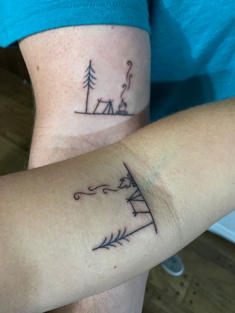 Camping Tattoos For Couples, Couple Camping Tattoo, Camping Couple Tattoos, Canoe Tattoo Ideas, Nature Matching Tattoos, Camping Tattoo For Women, Campfire Tattoo Simple, Simple Camping Tattoo, Matching Nature Tattoos