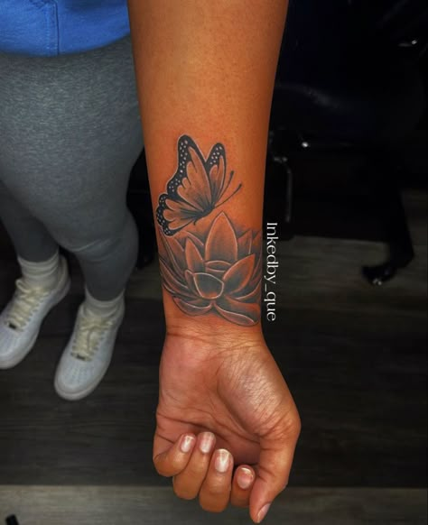 Cover Up With Butterfly Tattoo, Wrap Around Ankle Tattoos Black Women, Butterfly Lotus Flower Tattoo, Lotus Flower Butterfly Tattoo, Inner Wrist Tattoos For Women Unique, Wrist Sleeve Tattoos For Women, Lotus Flower And Butterfly Tattoo, Lotus Flower Cover Up Tattoo, Lotus Flower Tattoo Sleeve