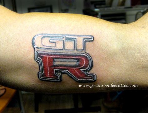 GTR logo tattoo on inner bicep Gtr Tattoo Design, Gtr Tattoo, Tattoo On Inner Bicep, Gtr Logo, Motor Tattoo, Design Tattoos, Geometric Tattoo Design, Gtr R35, Grey Colour