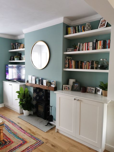 Log Burner With Carpet, Shelves Alcove Living Room, Victorian Living Room Alcoves, Lounge Lampshades, Recess Ideas Living Room, Bright Green Living Room Walls, Small Terrace Living Room, Sitting Room Shelving Ideas, Dark Blue And Beige Living Room