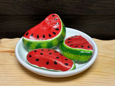 Bring on the summer decor! 🍉 These Painted rocks are beautiful  watermelon slices,  and a fun addition to your summer decor. Painted on both sides and triple sealed with acrylic spray. Put it in a pot on your porch, in a rock garden, on a desk, a tiered tray, or give as a gift. You can't go wrong with a nice slice of summer watermelon. sizes are approximate   1.  3" wide x 1.75"    2.  2.25" wide x 2.25"   3.  3" wide x 1.75"* *4.  1.75" wide x 2" & 1.3" wide x 1.5"    5.  1.75" wide x 2.25" & Watermelon Painting, Serving Ideas, Watermelon Slice, Mini Milk, Brownie Bites, Milk Shake, Watermelon Slices, Rock Ideas, Summer Watermelon