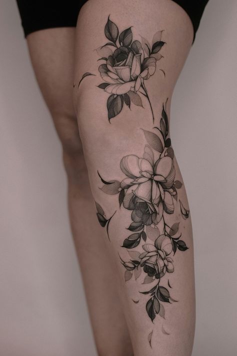 Arty's Floral Fantasies: How This Berlin-Based Artist Redefined Botanical Tattoos! | iNKPPL Womens Flower Leg Tattoo, Fantasy Floral Tattoo, Lotus Woman Tattoo, Fig Flower Tattoo, Botanical Bicep Tattoo, Full Body Floral Tattoo Women, Floral Leg Piece, Lower Back Floral Tattoo Cover Up, Blackout Floral Tattoo