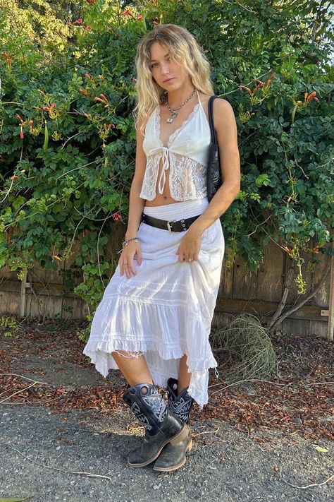 White Skirt Cowgirl Outfit, Sheer White Skirt Outfit, Cowboy Boots Maxi Skirt, Cowboy Boot Festival Outfit, All White Festival Outfit, Summer Cowboy Outfit, Long Skirt Cowboy Boots, Cowboy Boots With Skirt, 70s Cowboy Aesthetic