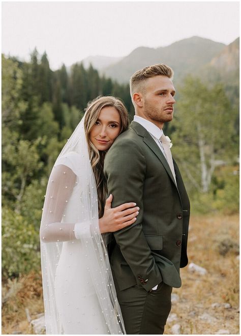 Green Suit And Wedding Dress, Groom With Green Suit, Bride And Groom Green Suit, Elopement Attire Grooms, Sage Green Couple Outfits, Summer Wedding Groom Suit, Mountain Elopement Groom Attire, Mountain Wedding Groom Attire, Groom Attire Green