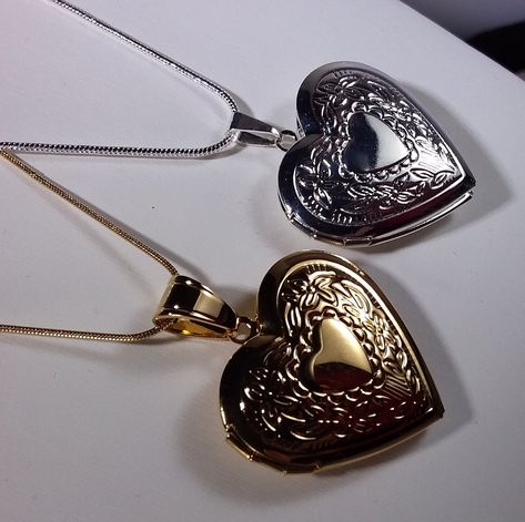 Shiny SILVER or GOLD Plated Heart  Shaped Photo Locket Memory Locket ☆  Measures 1 inch wide by 1 inch high ☆  Made of Stainless steel       and then SILVER or GOLD plated ☆  Opens up for photo insertion.  ☆  A FREE Surprise is INSIDE! ☆ YOU will put your own picture inside     at home after receipt of locket. ---CHOOSE YOUR LOCKET COLOR           FROM OUR PULL-DOWN MENU:       ☆ SHINY SILVER HEART LOCKET          Strung on a BRIGHT SILVER          stainless steel SNAKE chain         1 mm wide b Silver Heart Locket, Valentines For Daughter, Christmas Gift Daughter, Mom Daughter Gifts, Gold Heart Locket, Products Photography, Downtown Outfits, Heart Photo, Memory Locket