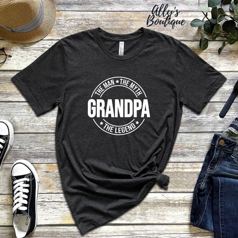 Grandpa Legend T-Shirt Description:  This updated unisex essential fits like a well-loved favorite, featuring a crew neck, short sleeves and designed with superior combed and ring-spun cotton that acts as the best blank canvas for printing. Features:  Sideseamed. Retail fit. Unisex sizing. Shoulder taping. Fabrication:  100% Airlume combed and ring-spun cotton, 32 single 4.2 oz. (Ash - 99% Airlume combed and ring-spun cotton, 1% poly) Customizations: If you want a custom shirt with your text or Grandpa Established Shirt, Grandpa Shirts Vinyl, Grandpa Shirt Ideas, Grandparents Shirts, Best Grandpa Shirt, Grandparent Shirts, Grandpa Shirts, Grandpa Tshirts, Grandparents Shirt