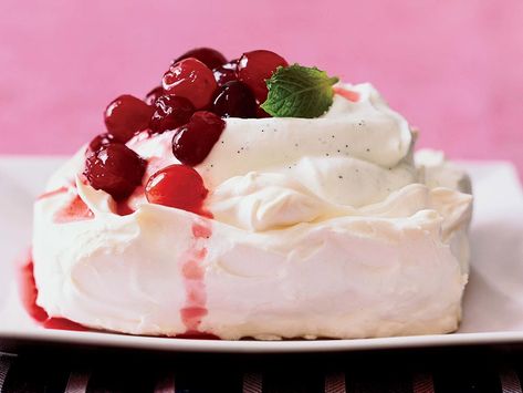 Cranberry and Orange Pavlovas | Food & Wine goes way beyond mere eating and drinking. We're on a mission to find the most exciting places, new experiences, emerging trends and sensations. Orange Pavlova, Australian Desserts, Orange And Cranberry, Chocolate Gingerbread Cookies, Crescent Cookies, Easy Holiday Desserts, Holiday Baking Recipes, Cranberry Recipes, Baking Project