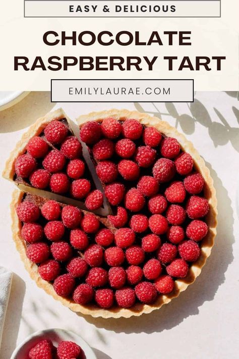 If you’re on the hunt for a dessert recipe that is equal parts elegant, romantic, and surprisingly easy, look no further than my Chocolate Raspberry Tart. Featuring a tender buttery pastry shell, rich chocolate ganache, and fresh tart raspberries, this showstopping centerpiece is as scrumptious as it is gorgeous. Raspberry Chocolate Ganache, Raspberry Tart Recipe, Chocolate Raspberry Tart, Ganache Tart, Chocolate And Raspberry Tart, Chocolate Ganache Tart, Raspberry Tart, Raspberry Desserts, Dark Chocolate Ganache