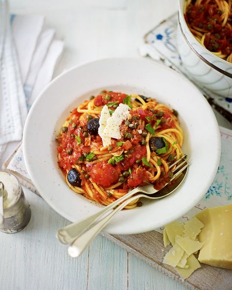 Vegetarians don't have to miss out on classic Italian spaghetti alla puttanesca, Rose Elliot's recipe leaves out the anchovies but is still full of ca Puttanesca Recipe, Spaghetti Alla Puttanesca, Vegetarian Spaghetti, Alla Puttanesca, Tomato Pasta Recipe, Pasta Puttanesca, Italian Pasta Recipes, Delicious Magazine, Vegetarian Pasta