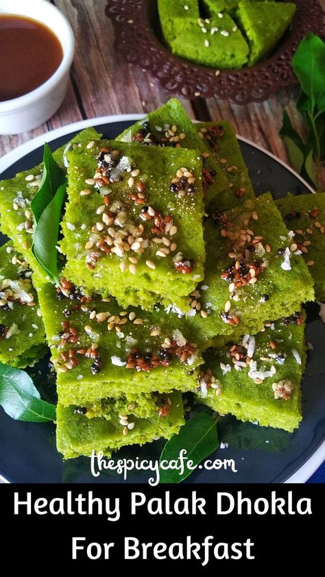 Palak dhokla also known as Spinach savory cake is a soft spongy Indian snacks recipe that is mostly served as a breakfast dish. It is a diabetic-friendly, gluten-free, nutritious recipe that is served with sweet & tangy tamarind chutney. This is a no onion no garlic recipe. Spinach dhokla is loved by kids too. This is a vegetarian, healthy, protein & iron-rich Spinach Dhokla recipe. #vegetarianrecipes #dhokla #spinach #diabeticfriently #healthycooking #glutenfree #indiansnacks #indianrecipes Gujarati Breakfast, Savory Cake, Recipe Spinach, Dhokla Recipe, Garlic Recipe, Tamarind Chutney, Healthy Recipes For Diabetics, Iron Rich, Indian Breakfast