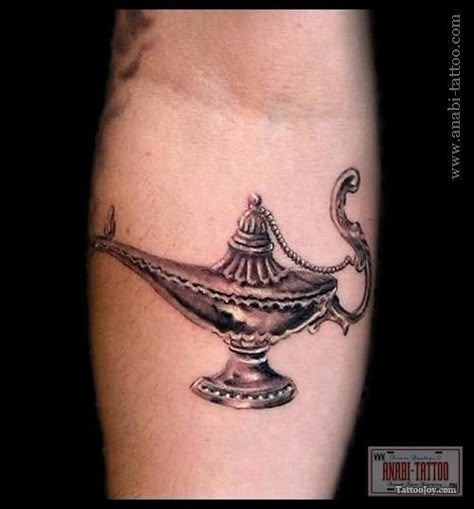 Magic Lamp Tattoo, Lamp Tattoo Design, Genie Lamp Tattoo, Place For Tattoo, Lamp Tattoo, Places For Tattoos, Nice Tattoos, Peacock Feather Tattoo, Bottle Tattoo