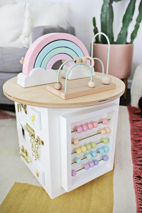 Toddler Activity Center DIY! - A Beautiful Mess Baby Toys Diy, Diy Bebe, Toddler Activity, Activity Center, Diy Toddler, Wooden Baby Toys, Baby Activities, Woodworking Projects That Sell, Busy Board