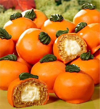 Sweeten up your Thanksgiving dessert with these delightful and beautiful pumpkin mini cakes, similar to petit fours. Consisting of a dozen delicately spiced cakes with nutmeg and ginger and filled with a luscious cream cheese center, these pumpkin cakes are perfect for your own Thanksgiving or to give the host or hostess to say “thanks!”: Pumpkin Cakes, Cake Ball, Ball Cake, Beautiful Pumpkins, Thanksgiving Treats, Monkey Bread, Thanksgiving Desserts, Fall Treats, Spice Cake