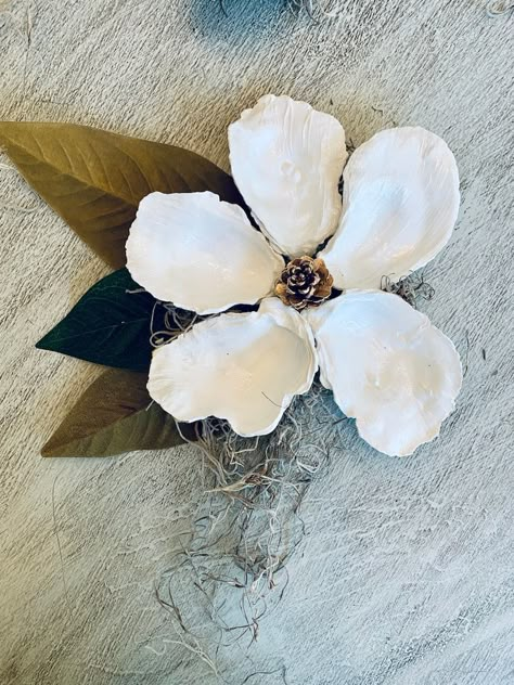 Wreaths With Shells, Oyster Shells Wall Art, Magnolia Oyster Shells, She’ll Trinket Dish, Things To Make With Oyster Shells, Oyster Shell Projects, Oyster Shell Wall Art, Olive Shell Crafts, Diy Oyster Shell Crafts