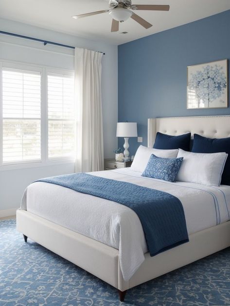 Create a stunning accent wall in your blue and white master bedroom using patterned wallpaper or bold paint. Complete the look with crisp white bedding, a plush blue area rug, and decorative accents in matching shades to bring it all together. Master Accent Wall, White Sitting Room, Blue And Pink Bedroom, Beautiful Bedroom Colors, Home Decor Cozy, Patterned Wallpaper, Blue Bedroom Decor, Guest Bedroom Decor, Bedroom Wall Designs