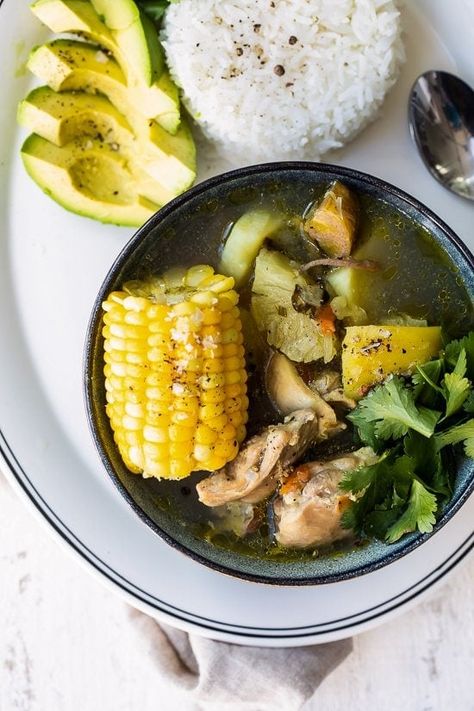 Sancocho de Pollo, a hearty soup almost like a stew, is a traditional dish in the Antioquia region of Colombia that combines potatoes, yuca, corn, plantains, and chicken. Chicken Sancocho, Colombian Chicken, Dinner Ideas Air Fryer, Sancocho Recipe, Sancocho Colombiano, Gina Homolka, Colombian Dishes, Easy And Healthy Recipes, Homemade Soup Recipe