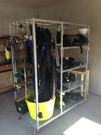 Hangar Design, Garage Storage Inspiration, Gear Room, Sports Storage, Gear Storage, Boat Restoration, Scuba Diving Equipment, Dorm Room Designs, Scuba Diving Gear