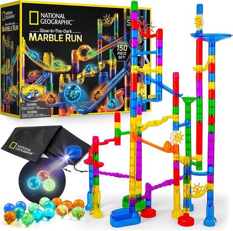 STURDY TIGHT-FIT PIECES – This construction kit is designed to fit together snuggly, so your marble maze won’t fall apart while you play. With 9 sturdy bases, 26 exciting action pieces, and 85 clear smooth-run tube pieces, our kit has countless imaginative configurations. GLOW IN THE DARK MARBLES – The marble run kit includes 6 different colors of glow in the dark glass marbles that shine bright as they zig-zag down the marble run. Also Includes UV light to quickly recharge the marbles. Glow Run, Marble Toys, Marble Race, Marble Maze, Super Sets, Marble Run, Easter Gifts For Kids, Stem Toys, Activity Toys