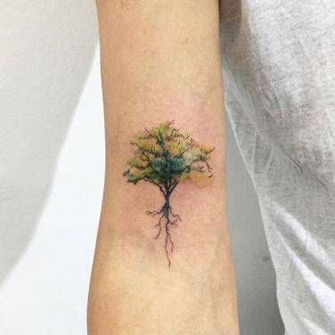 85 Most Beautiful Tree Of LIfe Tattoo Ideas | YourTango Hongdam Tattoo, Tree Roots Tattoo, Watercolor Tattoo Tree, Tree Tattoo Arm, Roots Tattoo, Oak Tree Tattoo, Tattoo Thoughts, Tattoo Tree, Tree Tattoos