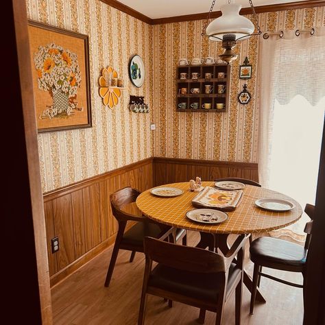 I’ve realized one of the things I’m missing to bring home the 70s style is a lot of plants. 🪴 Home decor | vintage vibes | groovy | hippie | flower power | seventies | thrifted home | wood paneling | mushrooms | crewel | embroidery | dining room | kitchen | yellow | mustard | wallpaper 70s Wainscoting, Groovy Dining Room, 1920 Dining Room, 70s Paneling, 70s Wood Paneling, 70s Dining Room, 1970s Dining Room, 70s Apartment, Wood Paneling Decor