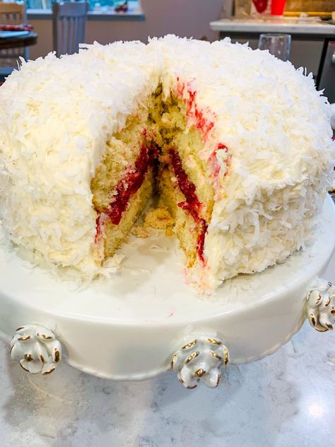 Cake Recipes With Raspberry Filling, Coconut Cake With Filling, Raspberry Filled Coconut Cake, Layer Cake With Fruit Filling, Coconut And Raspberry Cake, Apple Coconut Cake, Coconut Cake With Raspberry Filling, Coconut Raspberry Cake, Coconut Cake With Raspberry Filling Recipe