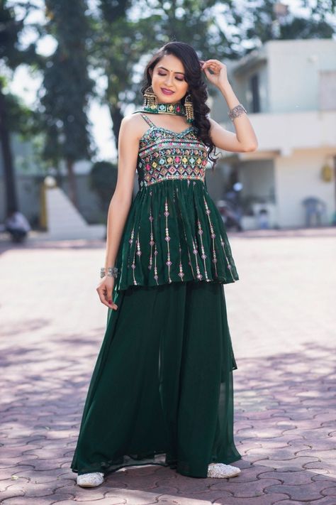 "Top Fabric :- Georgette Top Inner :- Crape Top Work :- Embroidery Thread + Zari + Sequence Work Top Colour :- Blue & Green Top Length :- 29\" Top Size :- M,L,XL,XXL Top Flair :- 3 Mtr Sharara Fabric :- Georgette Sharara Colour :- Blue & Green Sharara Inner :- Crape Sharara Length :- 40\" Sharara Size :- up to 40(For m,l,XLsize) Sharara Flair :- 1.25 Mtr Dupatta Fabric :- Georgette (2.25 Mtr) Dupatta Work :- Embroidery Thread + Zari + Sequence Work Weight :- 517 GM" Mehendi Outfits Sisters Green, Plazzo Suits Indian Party Wear, Green Sharara Suit, Sarara Dress, Indian Party Wear Dresses, Green Sharara, Long Choli Lehenga, Georgette Sharara, Sharara Designs