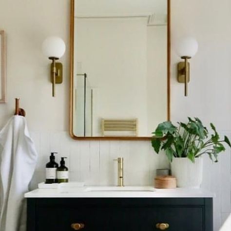 Harvey George Furniture Makers on Instagram: "Something beautiful to brighten up this miserable rainy Thursday ☔️ This wonderful ensuite bathroom was cleverly created by @tessalittlerinteriors ⭐️ So if it’s bathroom ideas you’re looking for, you can certainly gather ample inspo from this 🖤 Interior design: @tessalittlerinteriors Vanity unit @harvey_george_uk Kilburn brass knobs @corstonarchitecturaldetail Wall lights @astrolightinghome Wall and Floor tiles @CTCtiles #vanityunit #bathroomvani Harvey George Vanity Unit, Rainy Thursday, Ensuite Bathroom, Brass Knobs, Vanity Unit, Family Bathroom, Guest Bath, Furniture Maker, Wall And Floor Tiles