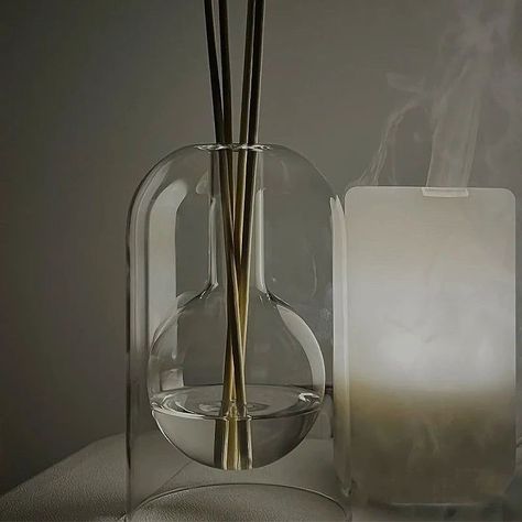 Elevate your space with our sleek aromatherapy diffuser 🌿✨ Its minimalist design not only adds a touch of elegance to any room but also fills it with soothing scents for a calming atmosphere. Breathe in relaxation, breathe out stress. Available now! themildstore.com #Aromatherapy #HomeDecor #Wellness Essential Oils Organization, Reed Diffuser Bottle, Diffuser Sticks, Essential Oil Storage, Diffuser Bottle, Hari Valentine, Oil Storage, Aromatherapy Diffuser, Essential Oil Bottles