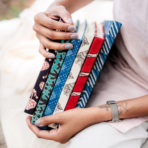 Featuring vibrant Indian hand-block print fabric covers, these handmade-paper diaries are perfect for artists, scrapbookers, and anyone who loves to write & sketch! Have a family member or friend who's into art? You've got the best gift for them in these landscape diaries. ❤️ - #HandmadeWithLove #IndianHandblockPrint #ArtistsDiary #ScrapbookingEssentials #UniqueGifts #StationeryLovers #CreativeJournaling #IndianCraftsmanship #handmadepaperdiaries #madeinindia #indianstationery Diary Photoshoot, Into Art, Block Printing Fabric, Handmade Paper, Fabric Covered, Print Fabric, Best Gift, Family Members, A Family