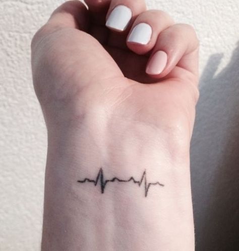 35 Satisfying Heartbeat Tattoo Designs, Ideas & Images ... #tattooideas #wristtattoos Tattoo Heartbeat, Heartbeat Tattoo On Wrist, Ekg Tattoo, Heartbeat Tattoo Design, Heartbeat Tattoo, Cool Wrist Tattoos, Wrist Tattoos For Guys, Tattoo For Son, Small Wrist Tattoos