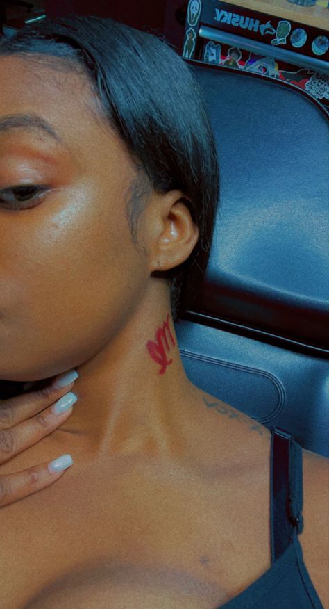 Neck tattoo red ink Red Ink Tats On Dark Skin, Virgo Tattoo Black Women, Neck Tattoo Red Ink, Red Neck Tattoos Women, Red Tattoo Dark Skin, Lip Tattoo On Neck, Red Ink On Dark Skin, Red Ink Neck Tattoo, Red Neck Tattoos