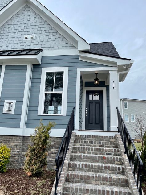 Gray Blue House Exterior, House Exterior Blue Gray, Blue Hardie Board Houses, Blue House With Brick, Blue Brick House, Blue Gray Painted Brick House, Blue Gray Outdoor House Paint, Dusty Blue House Exterior, Light Blue House Exterior Colour Schemes