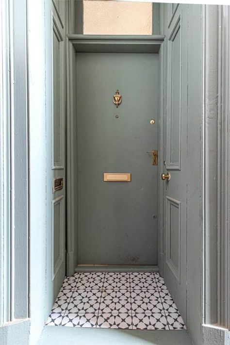 HOME TOUR Kate Flat Hallway, Glasgow Apartment, Kate Spiers, Central Heating Radiators, Rattan Headboard, Yellow Sofa, Wooden Floorboards, Pink Tiles, Standing Bath