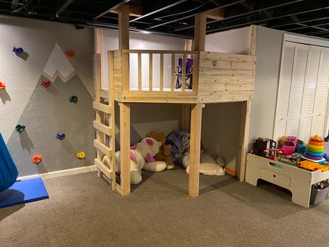 Basement Play Corner, Built In Fort Playroom, Unfinished Basement Toy Room, Playroom Fort Loft, Indoor Loft Playhouse, Indoor Playground Small Space, Diy Indoor Treehouse, Indoor Play Fort, Under The Stairs Play Area