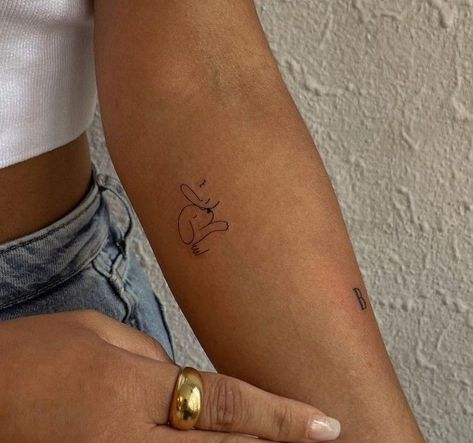 Small Minimalist Dog Tattoo, Cute Dog Tattoos For Women, Symbolic Dog Tattoo, Dainty Dog Tattoo Simple, Tattoo Ideas Dog Lovers, Small Animal Tattoos For Women Simple, Tattoos For Dog Moms, Dog Best Friend Tattoo, Tattoo For Dog Lovers