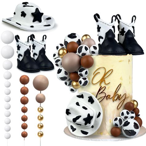 PRICES MAY VARY. SIZE: The cowboy hat is 3.22*1.18inch.The cowboy boot is 2.28*2.36inch. The dimensions may be slightly off due to hand measurement. PACKAGE: You will get 28pcs cowboy cake toppers,including 1pcs cowboy hat,2pcs cowboy boot cake toppers and 25pcs balls cake topper. MULTIPLE SUPPLIES: These cute cowboy cake toppers will add a beautiful atmosphere for your cake and help you decorate a charming party, which will be appreciated by your guest. WIDE APPLICATION: Our cowboy cake toppers Vaquera Cake, Western Theme Party Favors, Cow Print Baby Shower Ideas Boy, Cowboy Baby Shower Centerpieces, Cowboy Baby Shower Decorations, Vaquero Theme Party, Cowboy Boot Cake, Boot Cake, Cowboy Baby Shower Theme