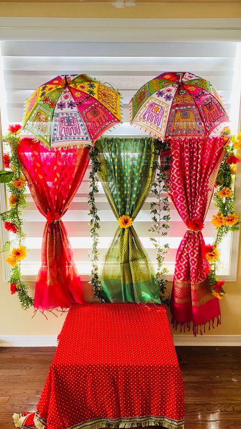 Perfect for festive season I did this decor for Janmastmi however you can use it for diwali, navratri and any other pooja. Please comment if you like it!! Teej Festival Stage Decoration, Umbrella Decorations For Ganpati, Decorating Ideas For Ganesh Festival, Decoration Ideas For Dandiya Night, Teej Festival Backdrop, Decoration For Gauri At Home, Rath Yatra Decoration Idea, Decorating Ideas For Pooja At Home, Teej Festival Decoration Ideas At Home