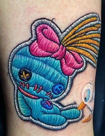 Scrump Tattoo, Stitching Tattoo, Embroidery Tattoo Ideas, Tattoo Patches, Betta Tattoo, Patch Tattoos, Embroidery Tattoos, Disney Stitch Tattoo, Lilo And Stitch Tattoo